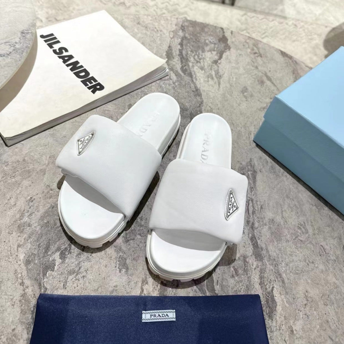 PRADA SHEARLING SLIDES WHITE LAMBSKIN