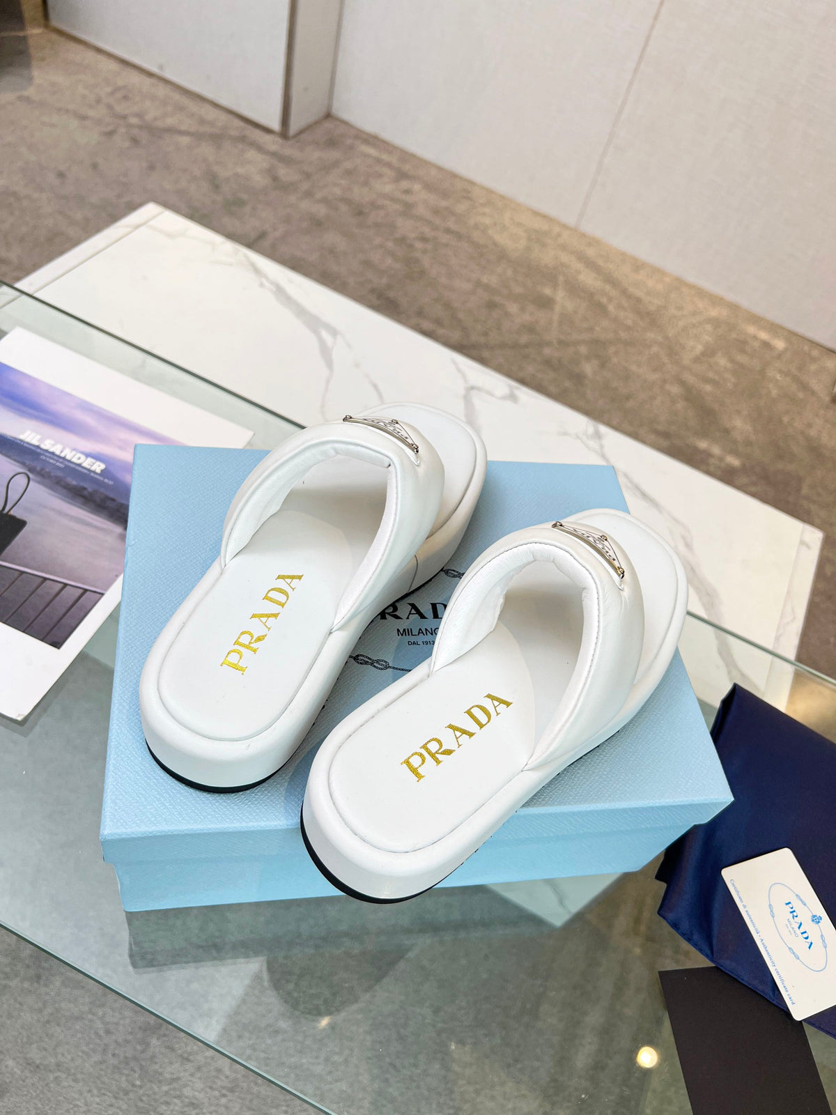 PRADA SOFT PADDED NAPPA THONG WEDGE SANLS WHITE LAMBSKIN