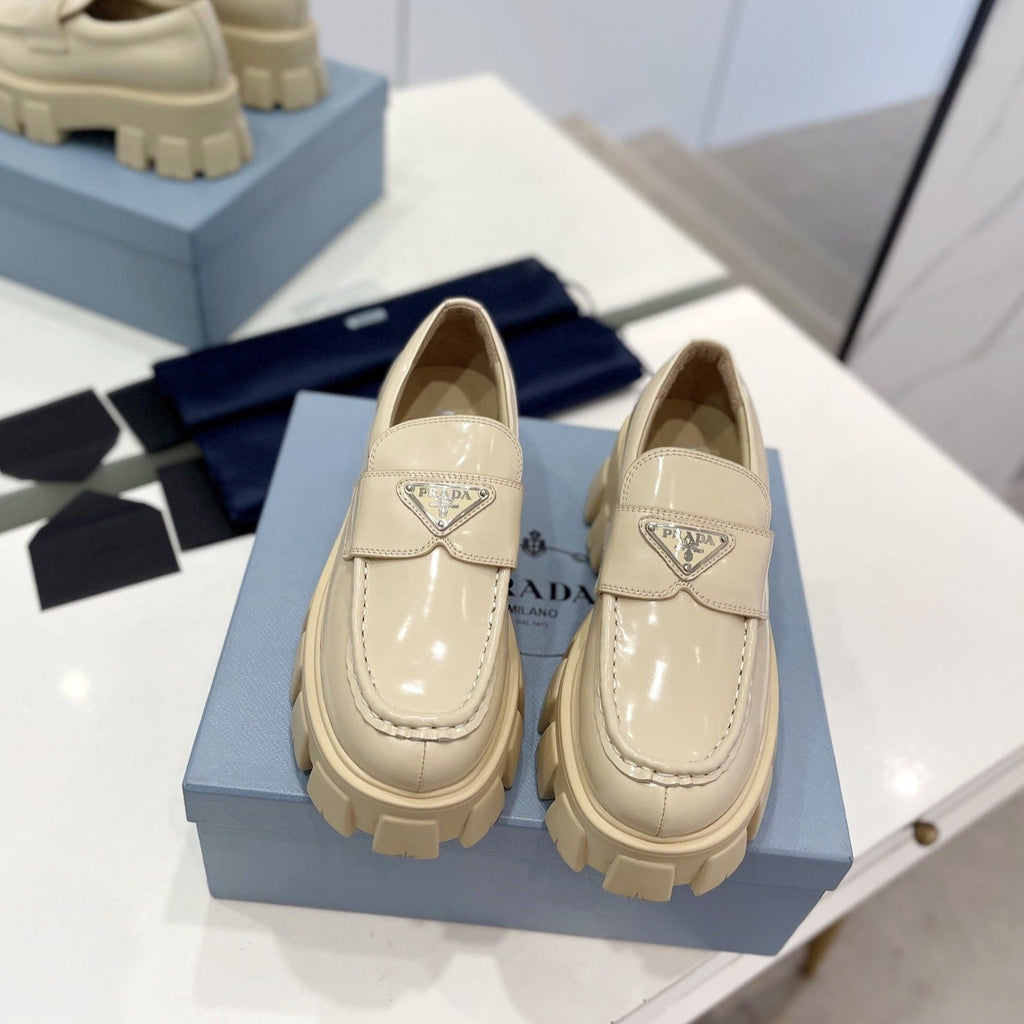 PRADA BRUSHED LEATHER MONOLITH LOAFERS BEIGE