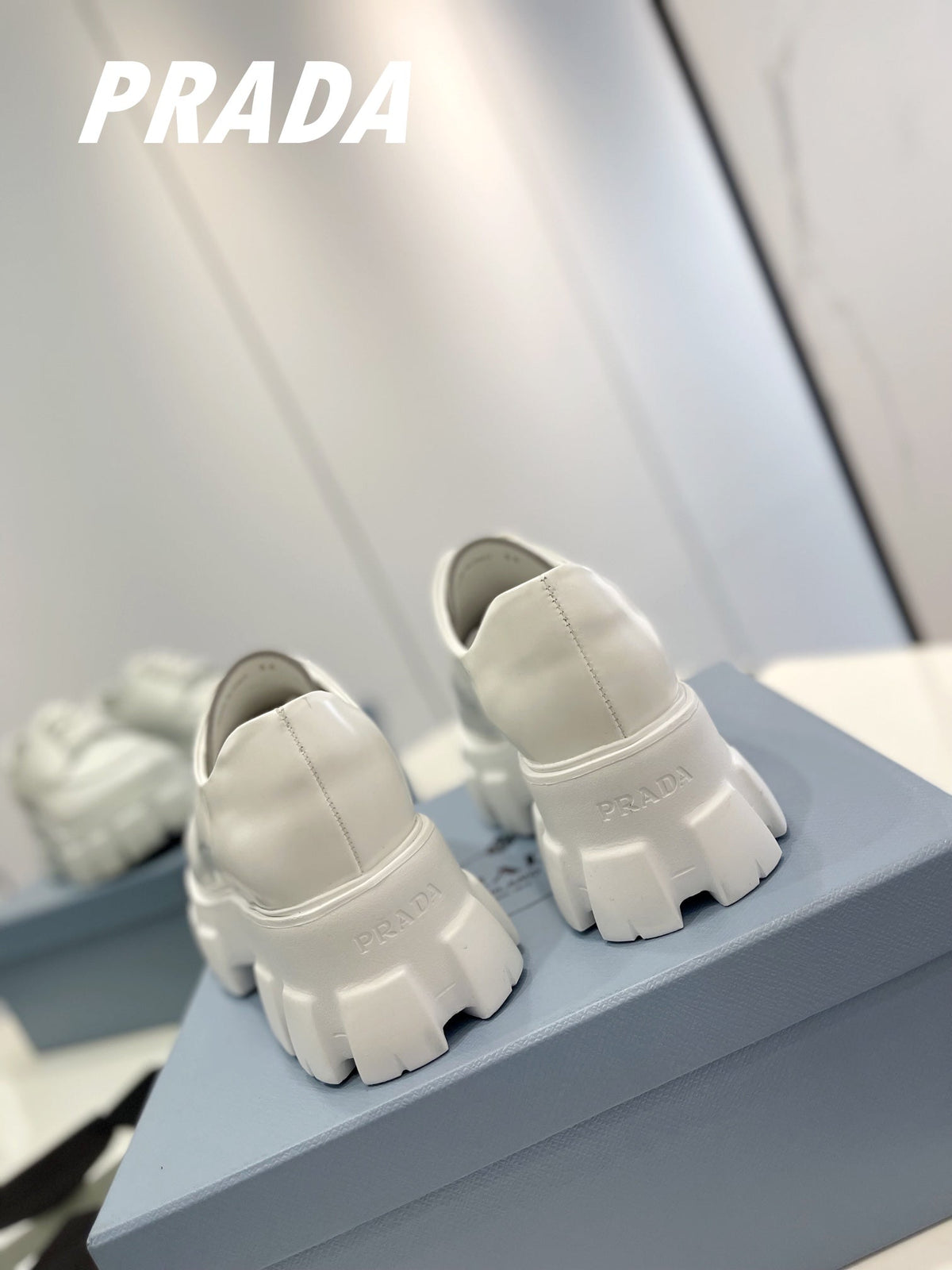 PRADA BRUSHED LEATHER MONOLITH LACE-UP LOAFERS WHITE