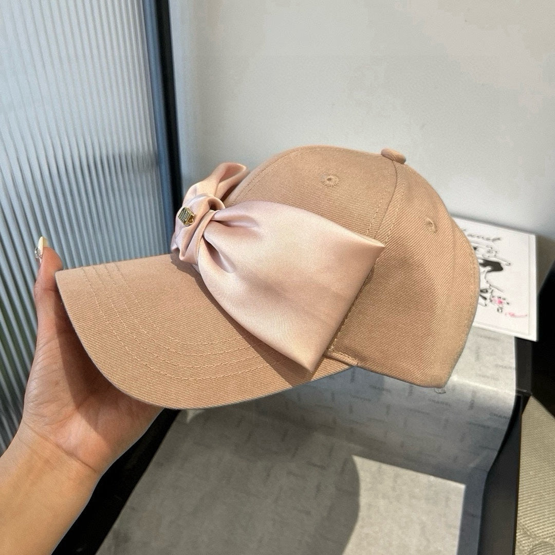 MM BASEBALL CAP IN BEIGE FABRIC WITH LARGE PINK BOW