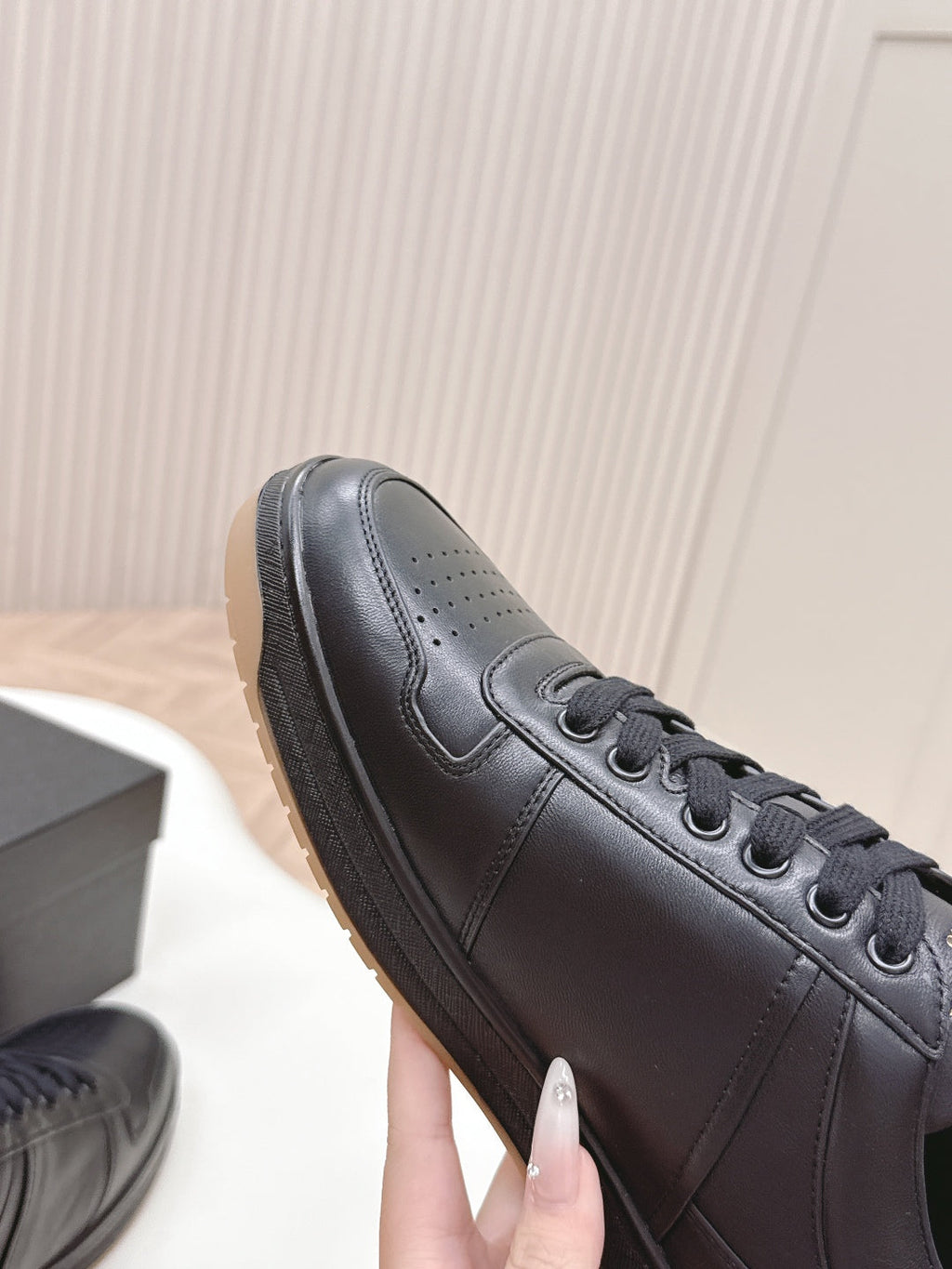 PRADA 25S DOWNTOWN SNEAKERS IN BLACK CALFSKIN