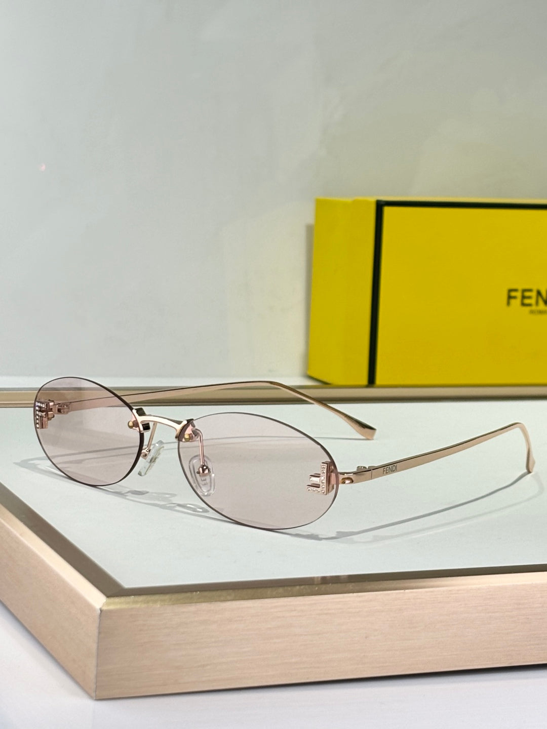 FIRST CRYSTAL RIMLESS OVAL FRAME SUNGLASSES FE4075US IN METAL