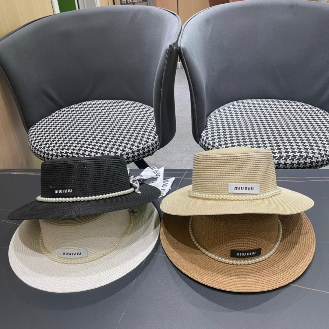 MM SMALL-BRIM STRAW HAT IN BLACK AND PEARL EMBELLISHED