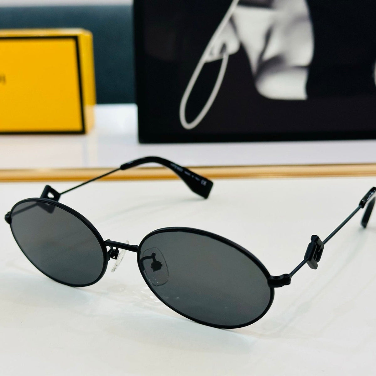 FIRST CRYSTAL OVAL FRAME SUNGLASSES E40151 IN METAL