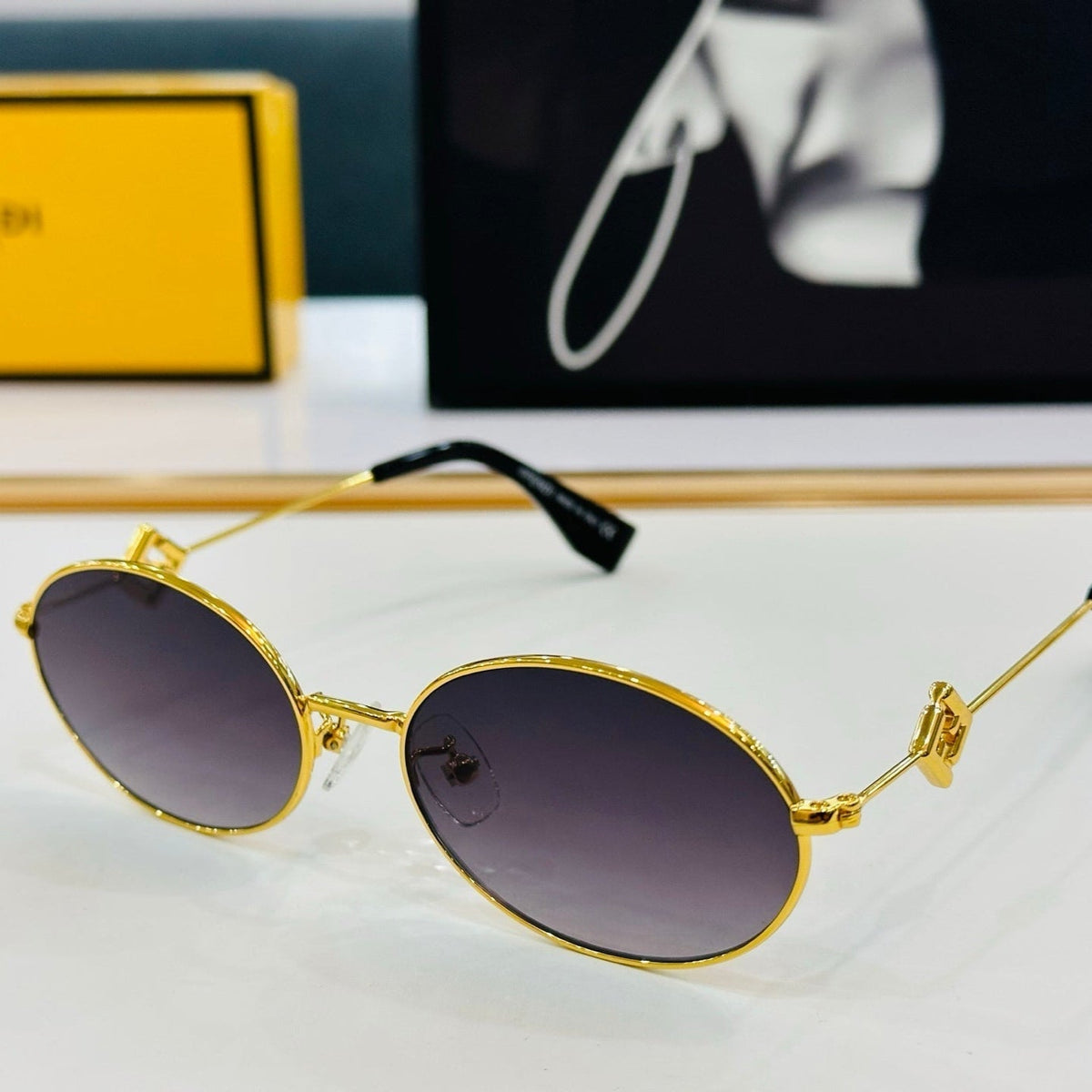 FIRST CRYSTAL OVAL FRAME SUNGLASSES E40151 IN METAL