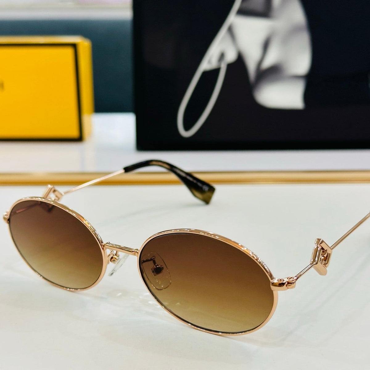 FIRST CRYSTAL OVAL FRAME SUNGLASSES E40151 IN METAL