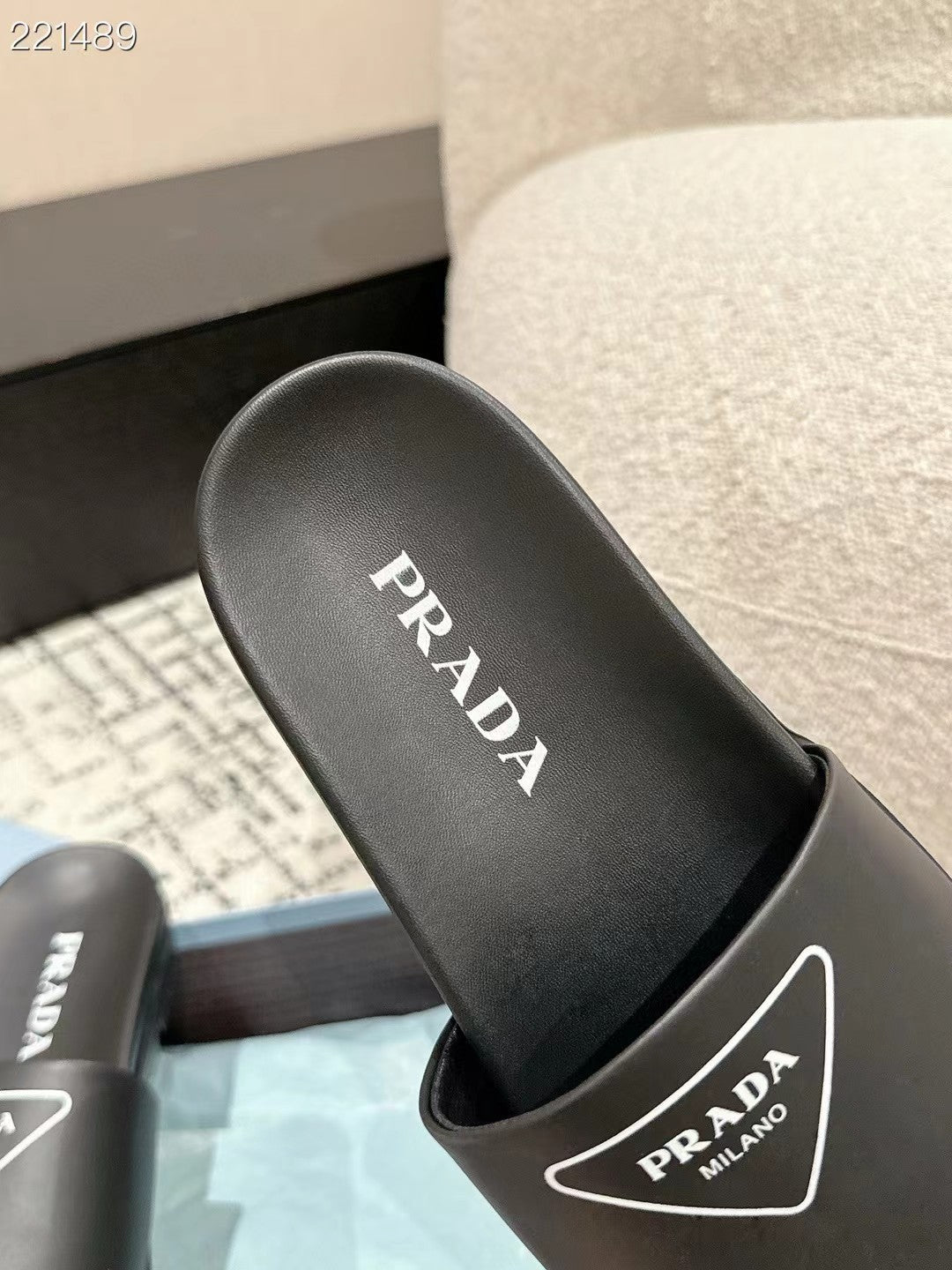 PRADA 25S RUBBER SLIDE IN BLACK CALFSKIN WITH LOGO