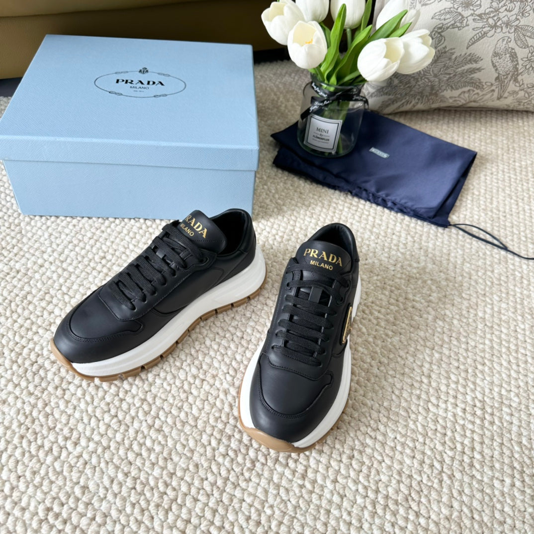 PRADA THICK SOLE SNEAKER BLACK CALFSKIN