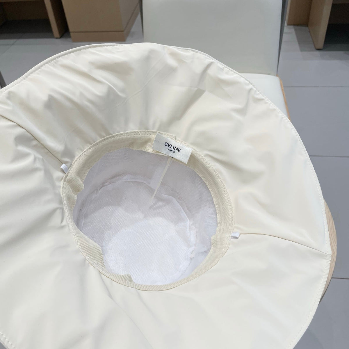 CELINE 25S BUCKET HAT 735013 IN IVORY