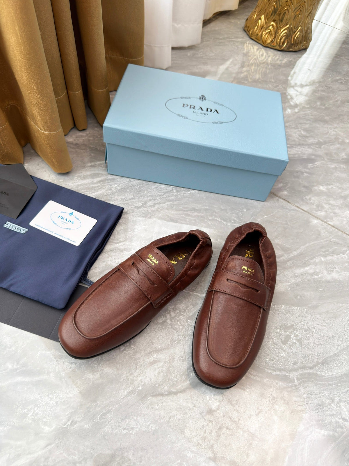 PRADA 25S LOAFERS IN BROWN CALFSKIN