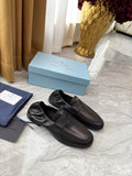 PRADA 25S LOAFERS IN BLACK CALFSKIN