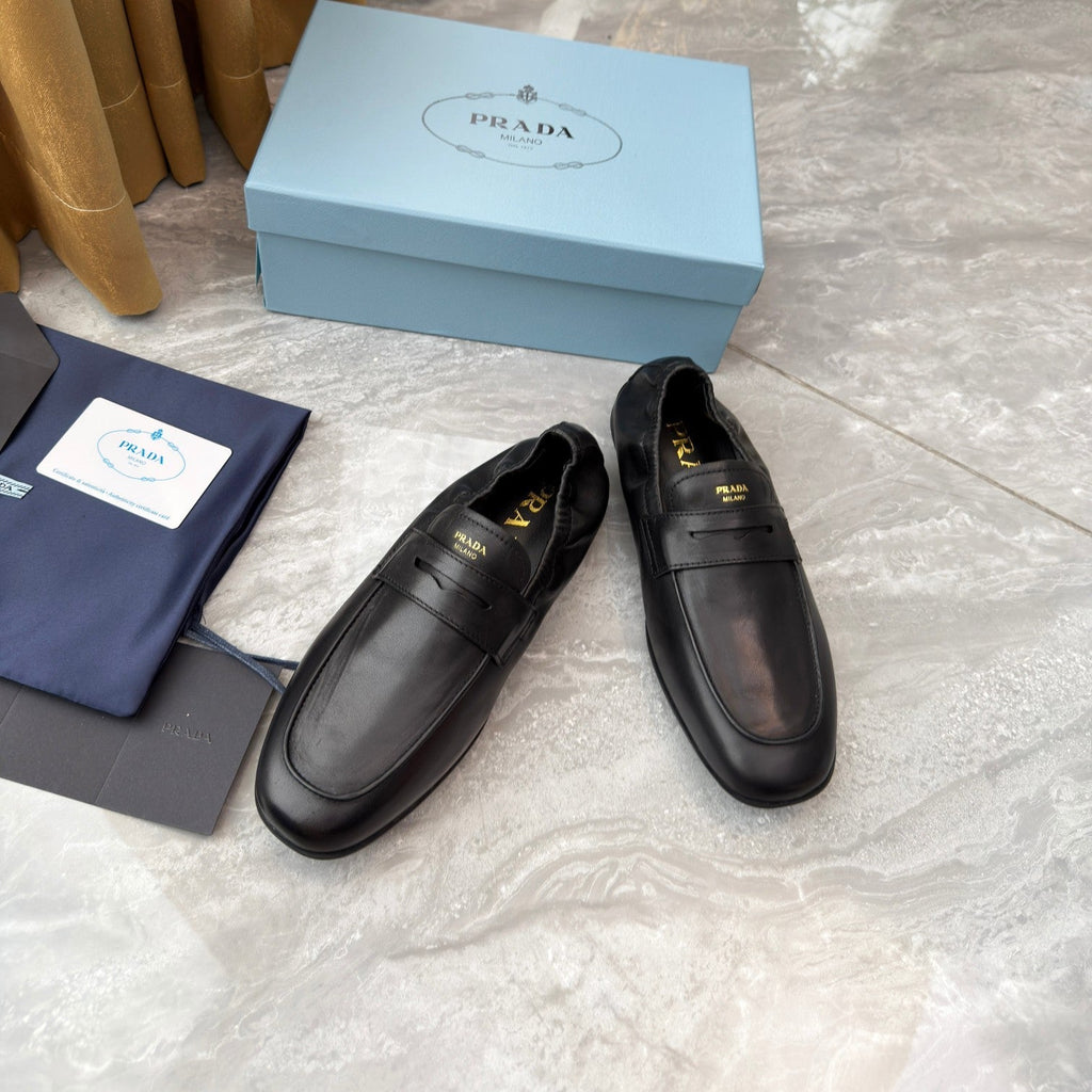 PRADA 25S LOAFERS IN BLACK CALFSKIN