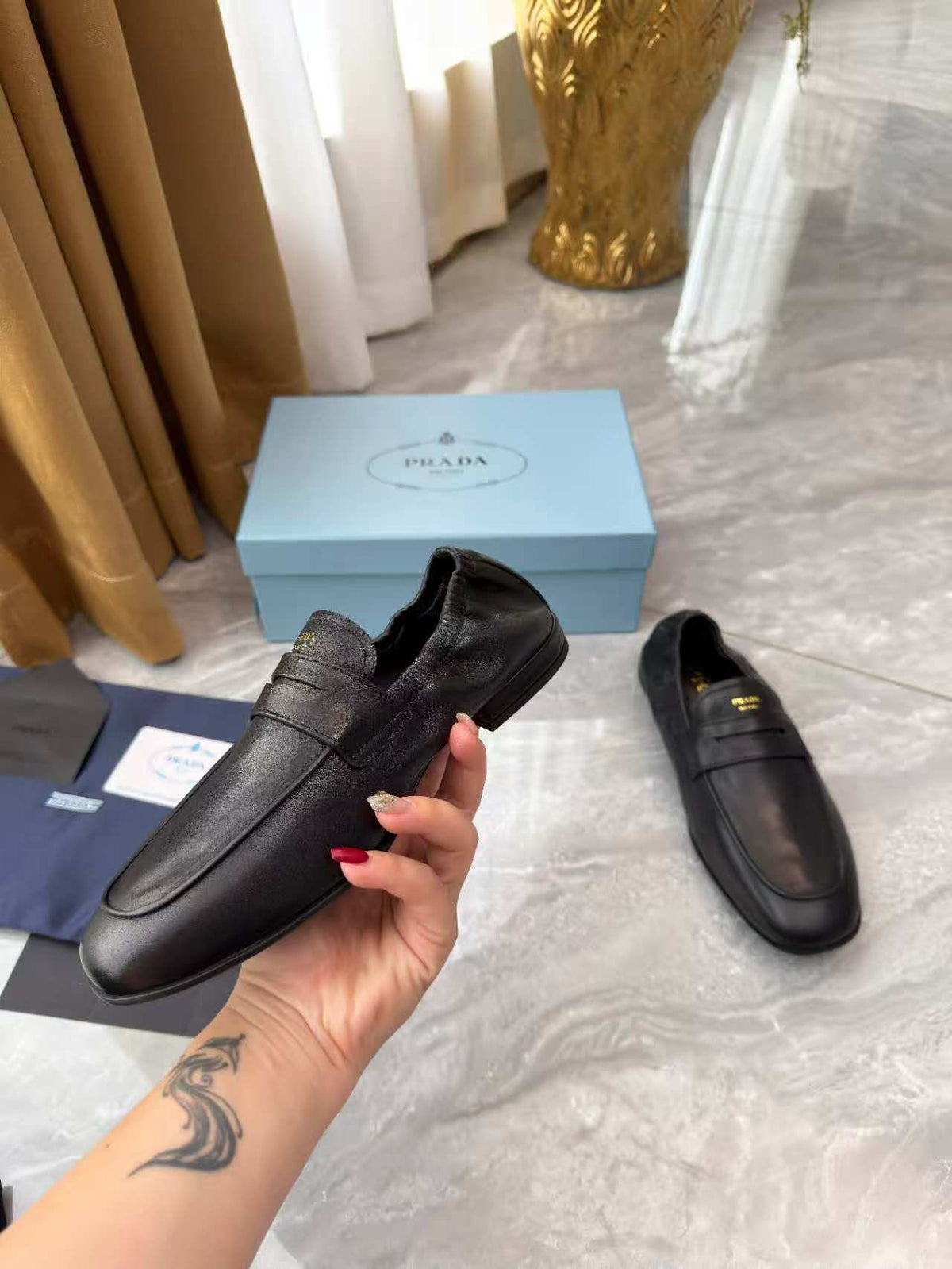 PRADA 25S LOAFERS IN BLACK CALFSKIN