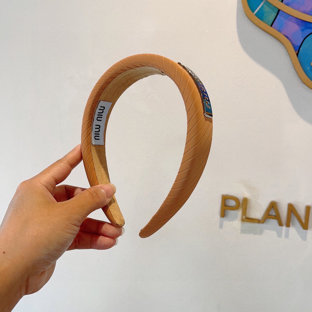 THICK HEADBAND IN BRONZE ORANGE DIAGONAL LEATHER 425479