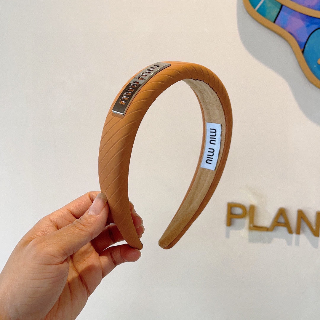 THICK HEADBAND IN BRONZE ORANGE DIAGONAL LEATHER 425479