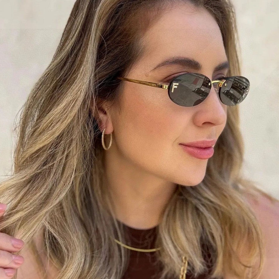 FIRST CRYSTAL RIMLESS OVAL FRAME SUNGLASSES 557152 IN METAL